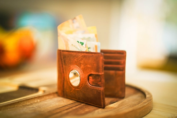 a-wallet-with-money-sticking